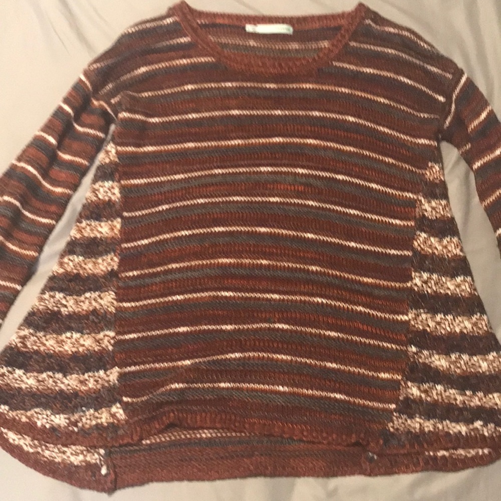 deep colored Maurice’s sweater